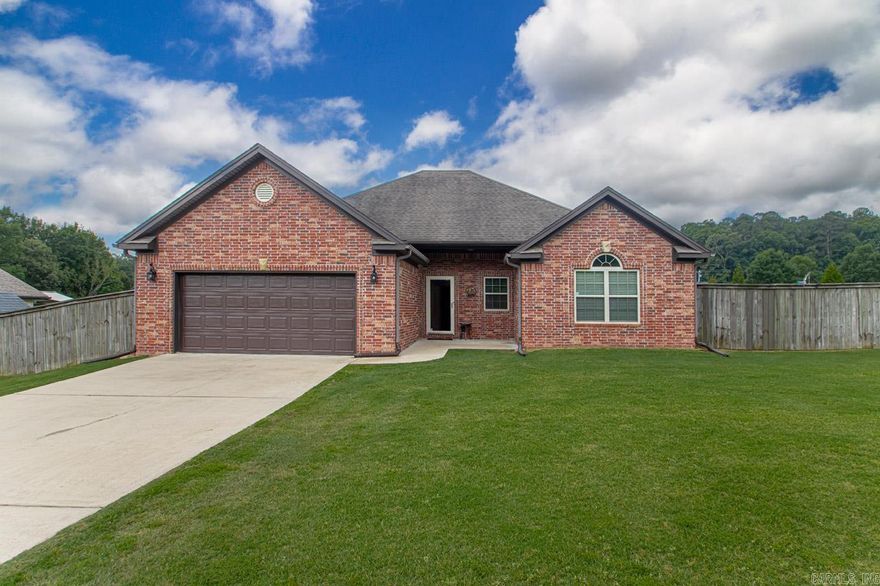 This Childress-built home in Hickory Nut Ridge subdivision has everything you've been looking for!  A fabulous house PLUS a 30x30 insulated, heated and cooled shop with plenty of space for projects, storage, or parking (and its own driveway)! The house garage is heated/cooled as well!  The house has beautiful crown molding throughout, 10' ceilings in living room, vaulted ceiling in guest room, wood-look ceramic tile floors, new carpet in bedrooms, and a gas log fireplace, this property offers both style and comfort! The kitchen is a chef's dream with granite countertops, stained cabinets, and modern appliances! The primary suite is a retreat with a jetted tub, walk-in shower, and double vanities! The backyard is perfect with a fully-fenced yard with two heavy-duty double gates, lots of fruit trees, a custom fire pit, covered porch off of the house, and a 15 x 30 lean-to behind the shop! This home truly has it all and is ready for you to make it your own. Don't miss out on this opportunity to own a stunning property in a desirable location!  Schedule a showing today, and see all that this home has to offer!  AGENTS SEE REMARKS!