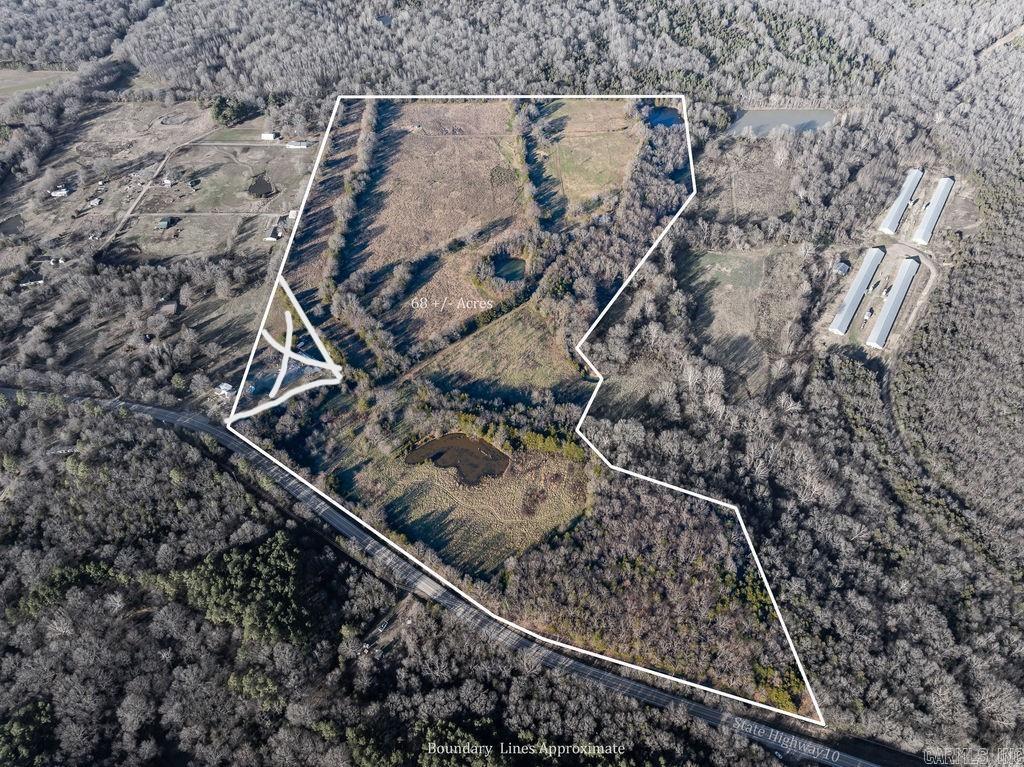 68+/- Acres, Fenced with 3 ponds. Property borders Chaffee land. Great building spots or perfect for cattle. Located in Sebastian county between Greenwood and Booneville.  White borders in photo are approximate, survey is attached. Mineral rights are not owned by seller and do not convey. Taxes are estimated