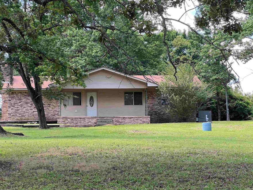 Family ready home! 5 bed 3 bath just on the out skirts of Glenwood! Custom cabinets, walk-in storm shelter, den, living room, all electric, and rural water.