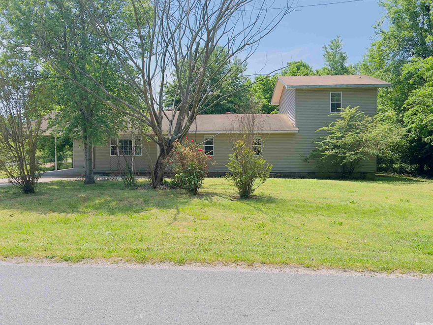 This property is located on a corner lot with a fenced backyard and a big back porch. Additionally, the storm cellar in the backyard ensures peace of mind during inclement weather. Inside the home, you'll discover a well-designed floor plan that maximizes both space and functionality. This charming 2 story home has 4 bedrooms and 3 bathrooms in total. There are 2 beds & 2 baths downstairs. 2 beds & 1 bath are upstairs. This home has a total of 1860 sq ft, with 1476 sq ft downstairs and 384 sq ft upstairs.  Convenience is a key advantage of this property. Within just minutes, you'll find yourself in close proximity to town amenities and shopping, making this location highly desirable for those seeking a convenient lifestyle. In summary, this property presents an excellent opportunity for those seeking a comfortable and convenient living experience. With its desirable corner lot location, fenced backyard, and proximity to essential amenities, this property is sure to capture your attention. Don't miss the chance to make this house your dream home. Listed for the great price of $139,900.