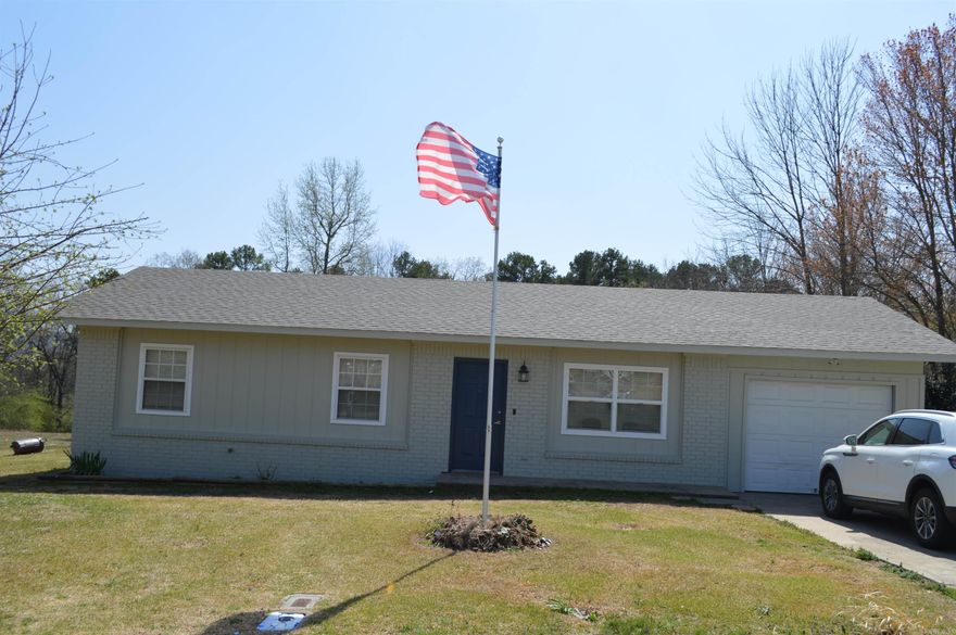 Great starter home or if you have school age children, this home is located 1 block from Heber Springs schools, walking distance from Sandy Beach and Greers Ferry Lake.  Seller just replaced roof, central heat and air, painting exterior and other repairs.  Boat launching and downtown shopping are a minutes drive.  This would make a great home for weekenders too!  Garage has storage room for your tools or lake toys.