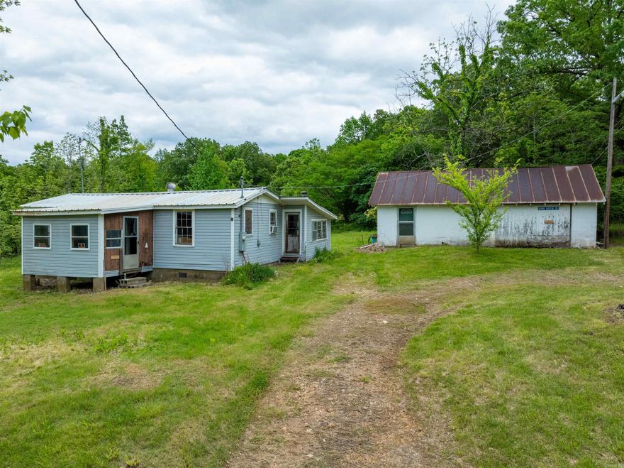 Fixer-Upper on 5 Secluded Acres with Shop & Pond – Just Outside Imboden, AR  If you’ve been dreaming of a place tucked away at the end of a quiet gravel road, this one might be just what you're looking for. This 3-bedroom home sits on 5 private acres and offers the perfect setup for someone ready to roll up their sleeves and make it their own.  The house needs some TLC, but with a little work, it could be a cozy country home. The land features a peaceful pond, plenty of space for a large garden, and room to raise animals.  There’s also a solid shop with a concrete floor and large overhead door—ideal for woodworking, storage, or farm projects.  Located just a few miles down a gravel road outside Imboden, Arkansas, this property offers privacy, space, and lots of potential.