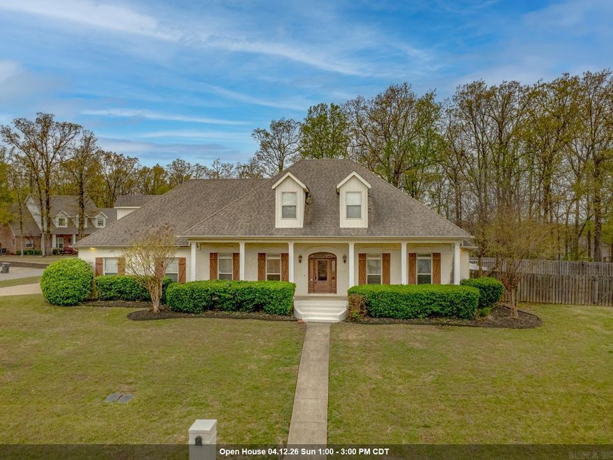Welcome to 4405 Wood Crest Drive in Lake Crest Estates - Jonesboro, Arkansas. Located in the Valley View School District, this 4-bed, 3.5-bath home offers over 3,800 sq. ft. of living space with classic brick colonial style. The main-level primary suite includes a sitting area, large closets (his and hers), a spacious bath with whirlpool tub, and walk-in shower.  The master suite is separate from the three other bedrooms on the same level. The kitchen features freshly painted cabinets and ample cabinet space. An island with an extra sink makes this kitchen a stand out! With an eat-in breakfast bar, the heart of the home opens to multiple living areas, including a formal dining room, great room, and office.Upstairs is a perfect area for office, game room, or living area and has an extra room. Situated on a corner lot, the home offers added privacy and a lake view from the front porch. The backyard is a private escape that includes an in-ground pool, patio, and big screened porch with fireplace. Additional features include a two-car garage, golf cart garage, and extra parking pad. Sellers offering a $3,000 carpet allowance with reasonable offer. Schedule your showing today!