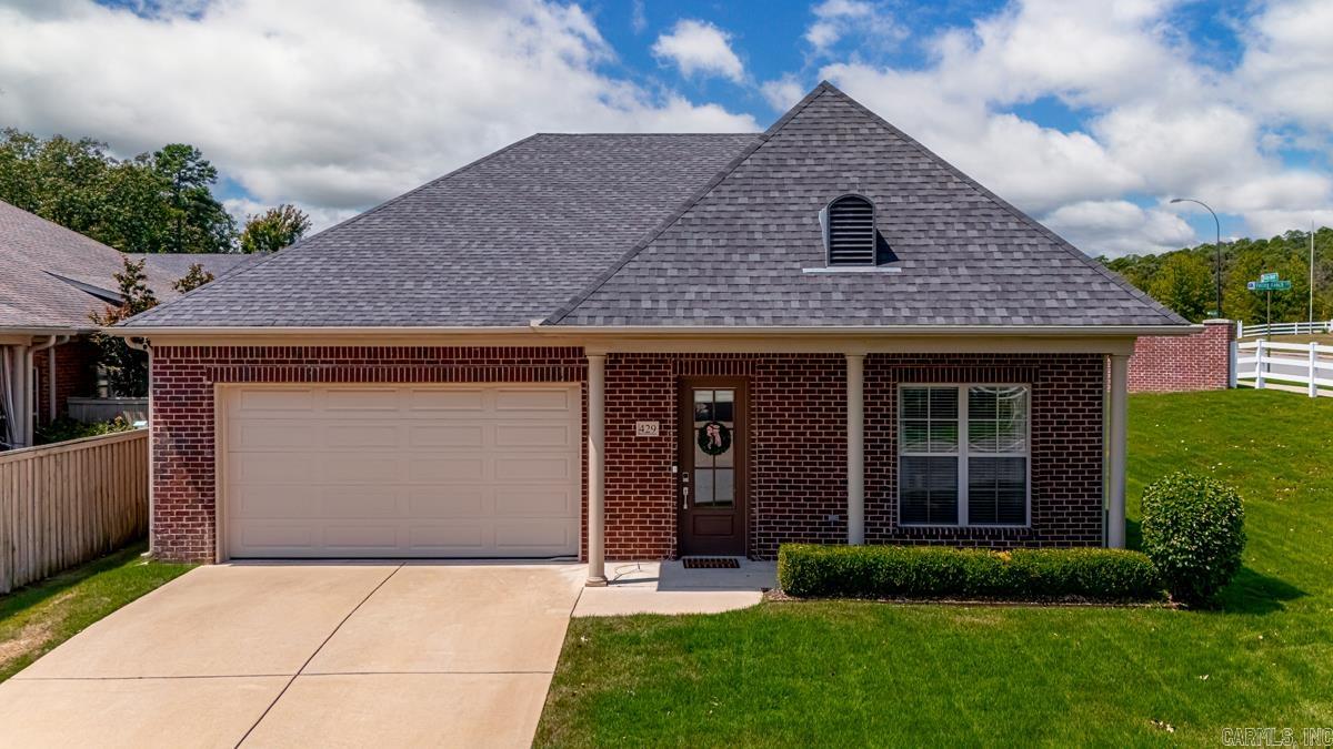Welcome to stunning home in Ranch West Villas, a private gated community in the heart of West Little Rock! This modern 2 bedroom, 2 bathroom home is filled with smart-home features for convenience and comfort. The open floor plan with 10ā ceilings, flows seamlessly from the living area into the kitchen, which is beautifully appointed with high-end finishes with a kitchen pantry and a butlerās pantry for added storage and prep space! Both bathrooms have been thoughtfully designed to feel spa-like, offering a relaxing retreat with modern finishes and a calming atmosphere. Step outside to a newly sodded zoysia lawn with a full sprinkler system, plus a quaint outdoor area perfect for morning coffee or evening gatherings. Thoughtfully designed inside and out, this home is truly low-maintenance living at its finest. The garage has new age bold series cabinets and Husky pvc flooring that will convey. Best of all ā itās the ONLY freestanding home in Ranch West Villas, giving you the rare combination of privacy and community amenities. With style, function, and location all in one, this home has so much to offer!
