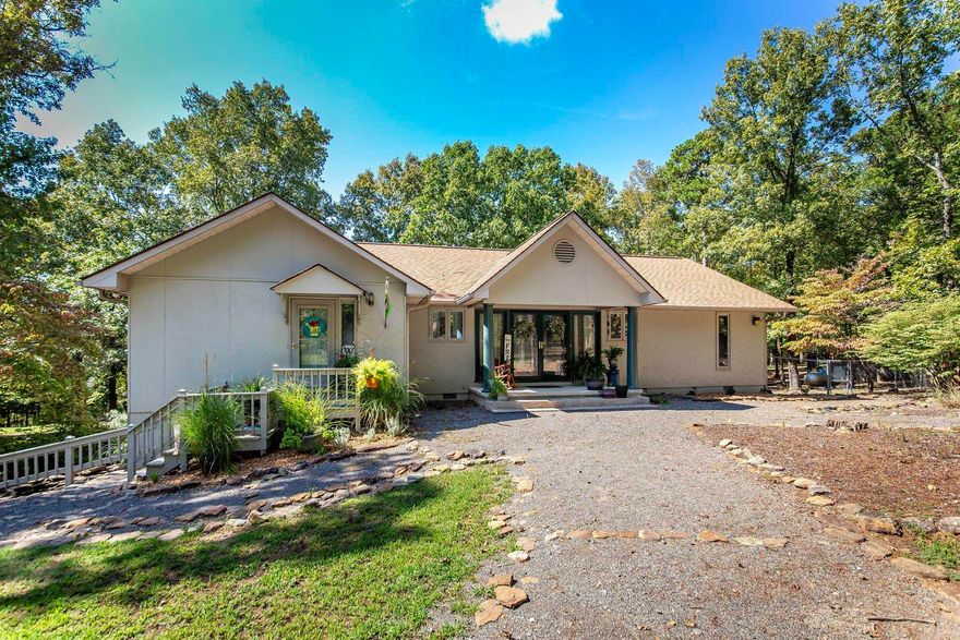 This beautiful home is located in a very desirable neighborhood. Enjoy watching the deer on this 2-acre property from your back deck, and fishing in a private lake located around the corner. Enjoy the quit country setting with the luxury of being close to town. Home offers 2800 sq ft of living space. A 20x30 garage/shop & a Bald Eagle storage building. Storage under the home. This home has been well maintained, 2 bedrooms, 1 bath, upstairs and 2 beds and 1 bath downstairs, 2 laundry rooms. Lg. open family room. Kitchen has beautiful granite counter tops and bamboo flooring throughout. This property is ready for you and your family to move in and enjoy.