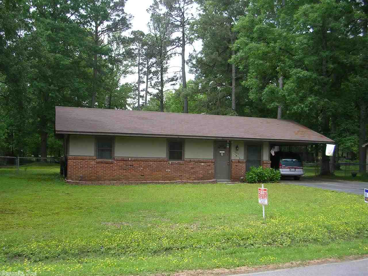 Look At The Price! Investor Alert! Or Starter Opportunity! Needs your ideas, some tender lovin' care and this one will work! Living room 3 bedrooms, 1 bath, carport, huge patio and a large fenced yard, Bryant Schools! Only $59,900!