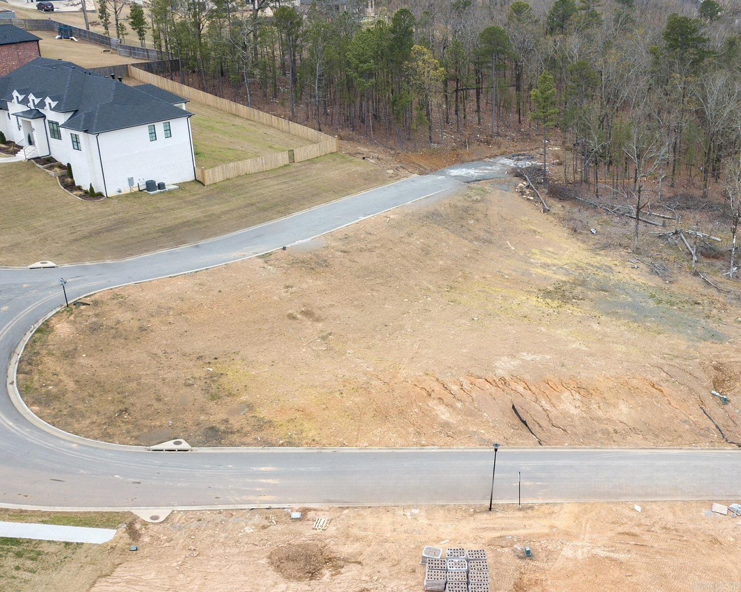 Imagine building your dream home on a corner lot in desirable Maumelle with a breathtaking city and vista view. Now make that dream a reality with this fitting lot! Utilities are underground. Must build a min of 1800 SF home. Community features are 30 miles of walking trails, Lake Willastein Park & Lake, Community center, a Senior center, schools, library, golf course, country clubs, shopping, & restaurants. Enjoy wildlife - deer, bald eagles, ect. Bring your own builder, or if you need assistance with where to get started building your dream home, give me a call.
