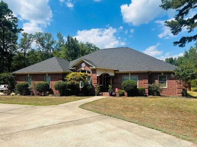 Custom built home on a large lot!!! This home is a game changer! Need extra space for entertaining? Step on in to this one! Lots of extra storage space as well! You really don't want to miss this one!