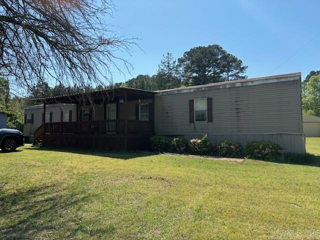 Has a barn & metal building on property.
