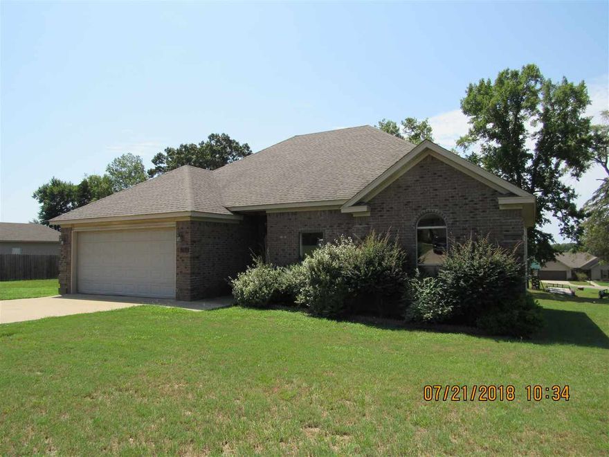 Split bedroom plan, oversized family room with corner fireplace, separate dining area, large kitchen with pantry and painted cabinets, oversized master suite with separate jet tub & shower, spacious bedrooms, freshly painted throughout, deck, 2 car garage.