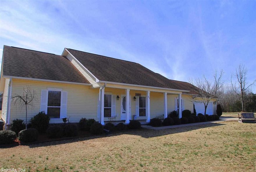 Spacious Executive home nestled on three acres! Looks like new, fresh interior paint, crown molding, beautiful floors! Family living at its best, open family, dining, living area! Great for entertaining! Custom cabinet filled kitchen with island! You will love the massive laundry room w/ built ins galore! Mst. suite w/ sitting area, bath has Jacuzzi plus separate shower.  Over sized garage, even a door for your lawn mower! Stamped concrete drive and walk way! See today! Sq. ft. est. feel free to measure.