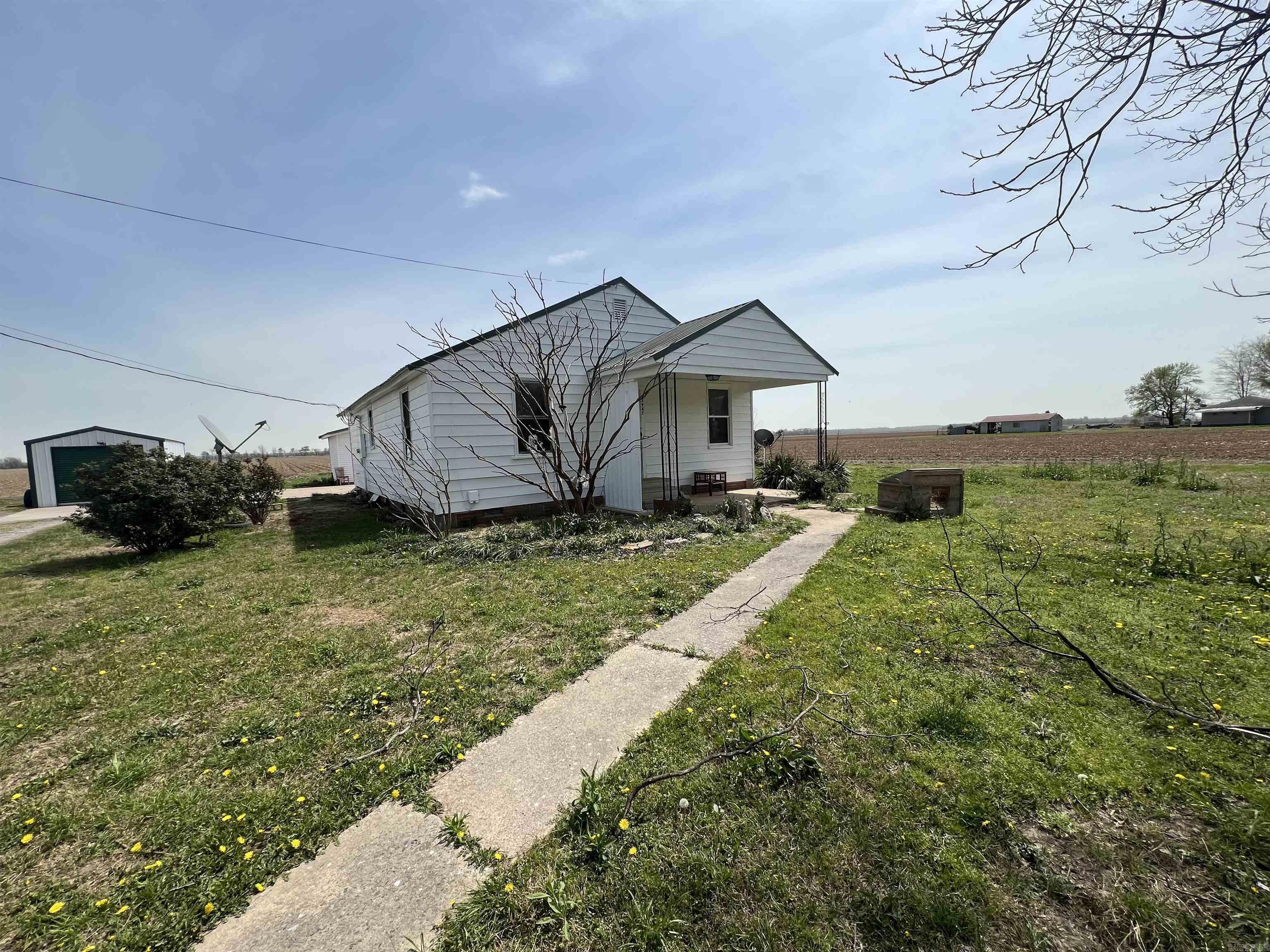 This 3 bedroom 1 bath home sits on 1/2 an acre and is an investors dream at a great price! Newly painted exterior, newer HVAC and a metal roof makes this property perfect for a rental opportunity, flip opportunity, or you could make this a retreat for a quiet place to live. This property has two out buildings and plenty of sunshine for a garden area. You can make this property picture perfect with a little TLC. Property sold As Is.