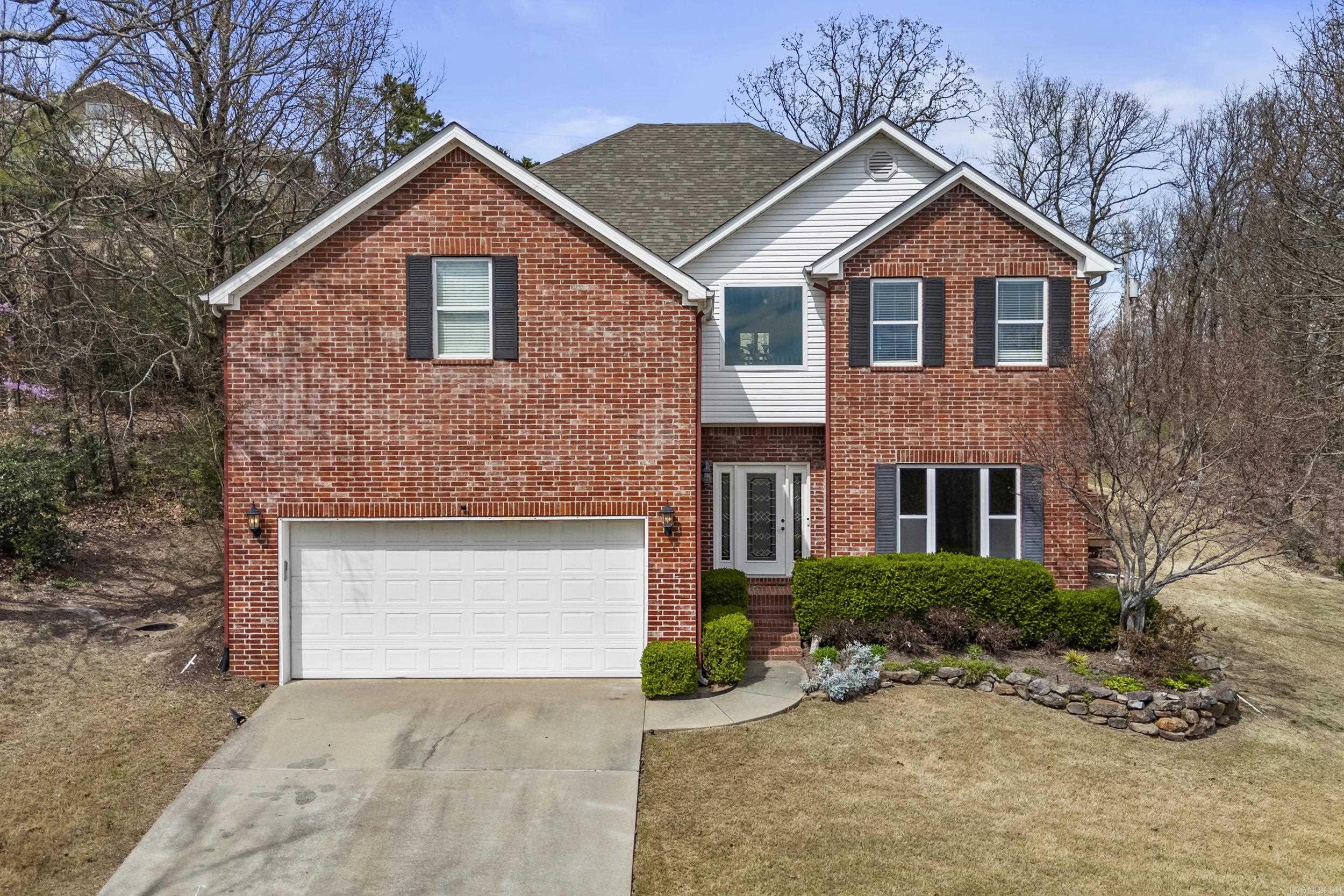 This home offers solid updates and efficient systems throughout. The kitchen has custom granite countertops, a downdraft vent system and good workspace. The living area includes a gas log fireplace with access to the back deck. There are two water heaters (gas and electric) with a recirculating system for upstairs use. Laundry and storage are located upstairs. Heating and cooling has been serviced recently. This home provides extra energy efficiency with BIBS insulation and insulated windows. The backyard has a stone retaining wall, deck, and built in landscaping space ready for your garden setup.