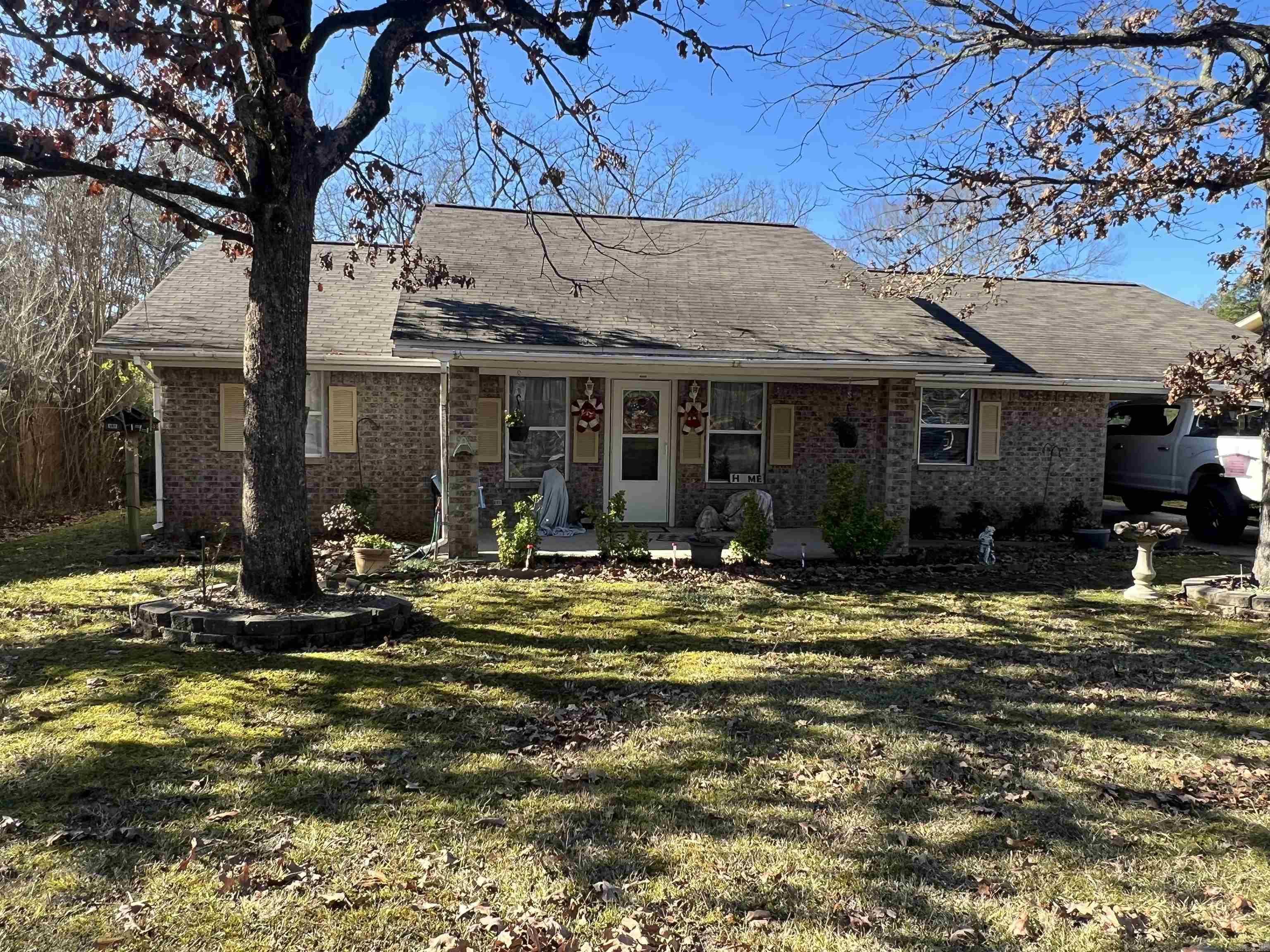 Get ready to be wowed by this stunning home! Host unforgettable gatherings in the amazing space, featuring an 18x40 pool with a 9-foot deep end, brand-new pool pump, cleaner, and updated plumbing. Enjoy the private, fully fenced backyard with a built-in grill on the back patio and a 10x13 metal outbuilding for your storage needs.  Step inside to find beautiful ceramic tile throughout, a new cook stove, refrigerator, and dishwasher, plus a new heat and air system. Freshly painted walls, trim, doors, and cabinets with updated hardware give the home a modern feel. Additional perks include three new storm doors, new ceiling fans in the primary bedroom and laundry room, and a walk-in closet in the primary bedroom.  Located in a quiet neighborhood within city limits, less than a mile from Mena High School and just a short drive to the hospital, Walmart, and the College. Make this incredible home yours and enjoy its comfort and style all year round! More photos to come!