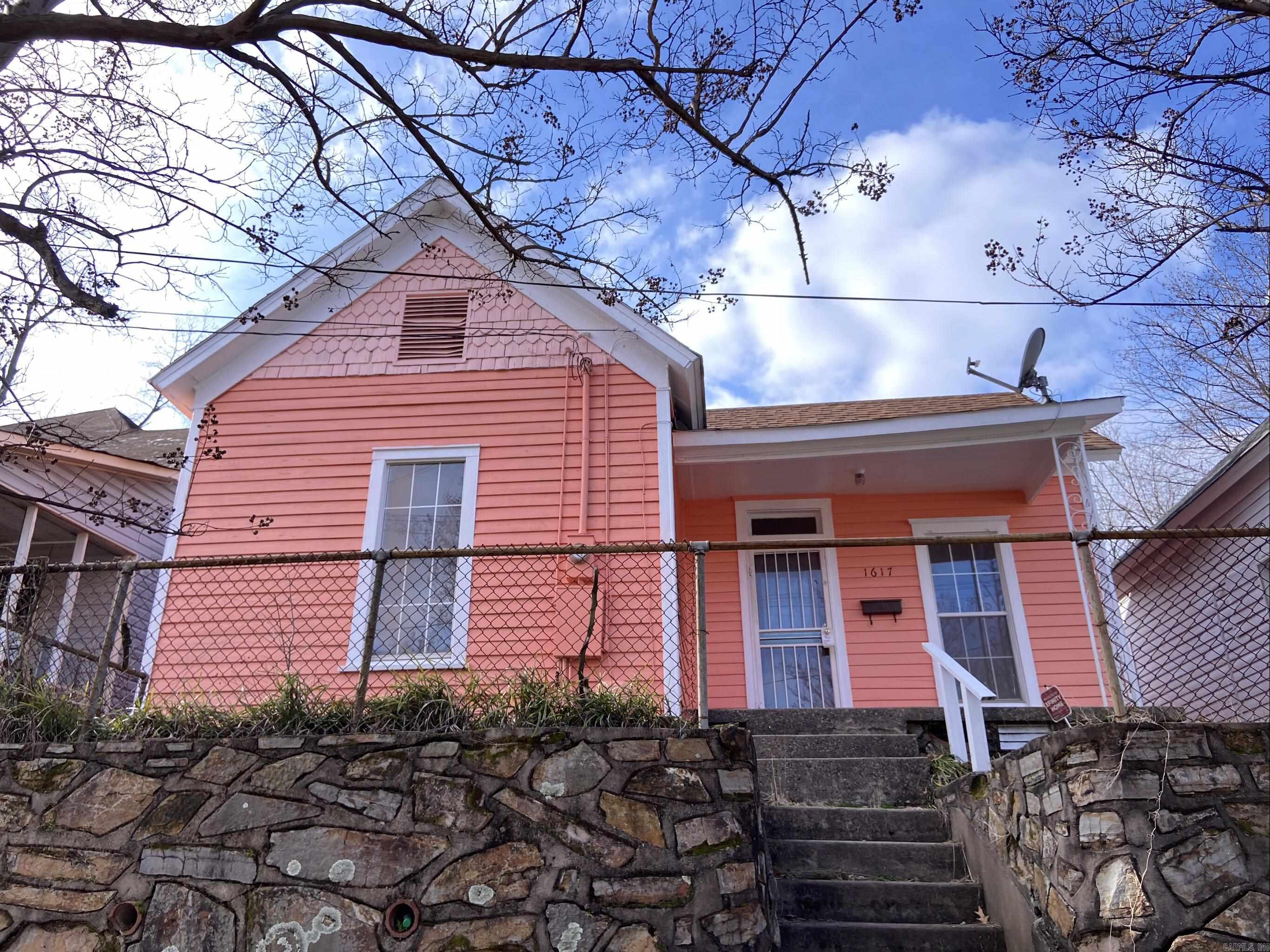 Charming Early 1900s Cottage – Move-In Ready! This adorable 2-bedroom, 1-bathroom home blends historic character with moderate updates, making it an ideal starter home or investment property. Recently rented for $850/month, it offers a solid return for investors. The home features freshly painted interiors, updated flooring, and plenty of natural light throughout. Enjoy spacious bedrooms (with an additional multi-use room which would make for a perfect office, crisp trim details, and turn-key condition. Whether you’re buying your first home or adding to your rental portfolio, this gem is ready to go! Can be sold as a package with 1621 Maple St. **Agent See Remarks**