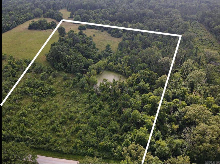 Beautiful property with a pond. Come take a look and see about building or using the 5 Acres for recreation.