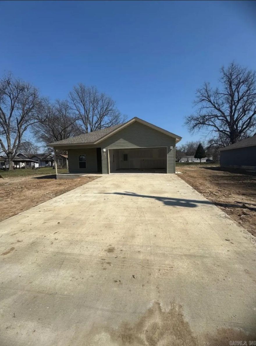 Welcome home to your custom build home in one of the safest cities of Mississippi County. 3 bedrooms, 2 baths, spacious, attached garage, with new and modern finishes. New range oven, microwave, and dishwasher.