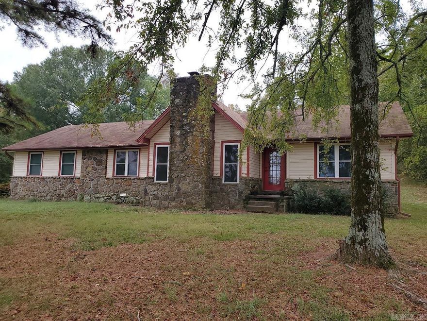 Want a personal slice of the country?  You will LOVE this home on five acres.  This ranch style home has all the amenities you could want.  Imagine spending time in your large family room anchored by a large rock fireplace, enjoying a cozy fire.  Separate dining area off the kitchen.   4 bedrooms, 2 full 1 half bath.   HUGE deck on the rear of the home for outdoor entertaining.  Home has a 30 x 30 Shop with electric and a chicken coop.  Call for your appointment today!