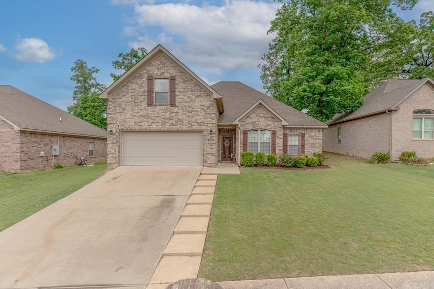 Schedule your showing now for this fantastic home located in peaceful Grace Village neighborhood.  You will appreciate the spacious living room perfect for entertaining and gatherings.  The Kitchen  features stainless appliances, granite countertops and abundance of storage.  The eat-in kitchen and breakfast bar make entertaining and meals a breeze! The home layout features split floor plan on the main level.  The master suite opens up into a private bath with double vanity, new shower, and his & her closets.  on the other side of the main level, there are two additional bedrooms with a bathroom.  Upstairs, a large bonus room is perfect for a fourth bedroom or flexspace, or Office. Heading outside, the backyard is large, fully fenced, and includes a covered patio for making fun memories outdoors.