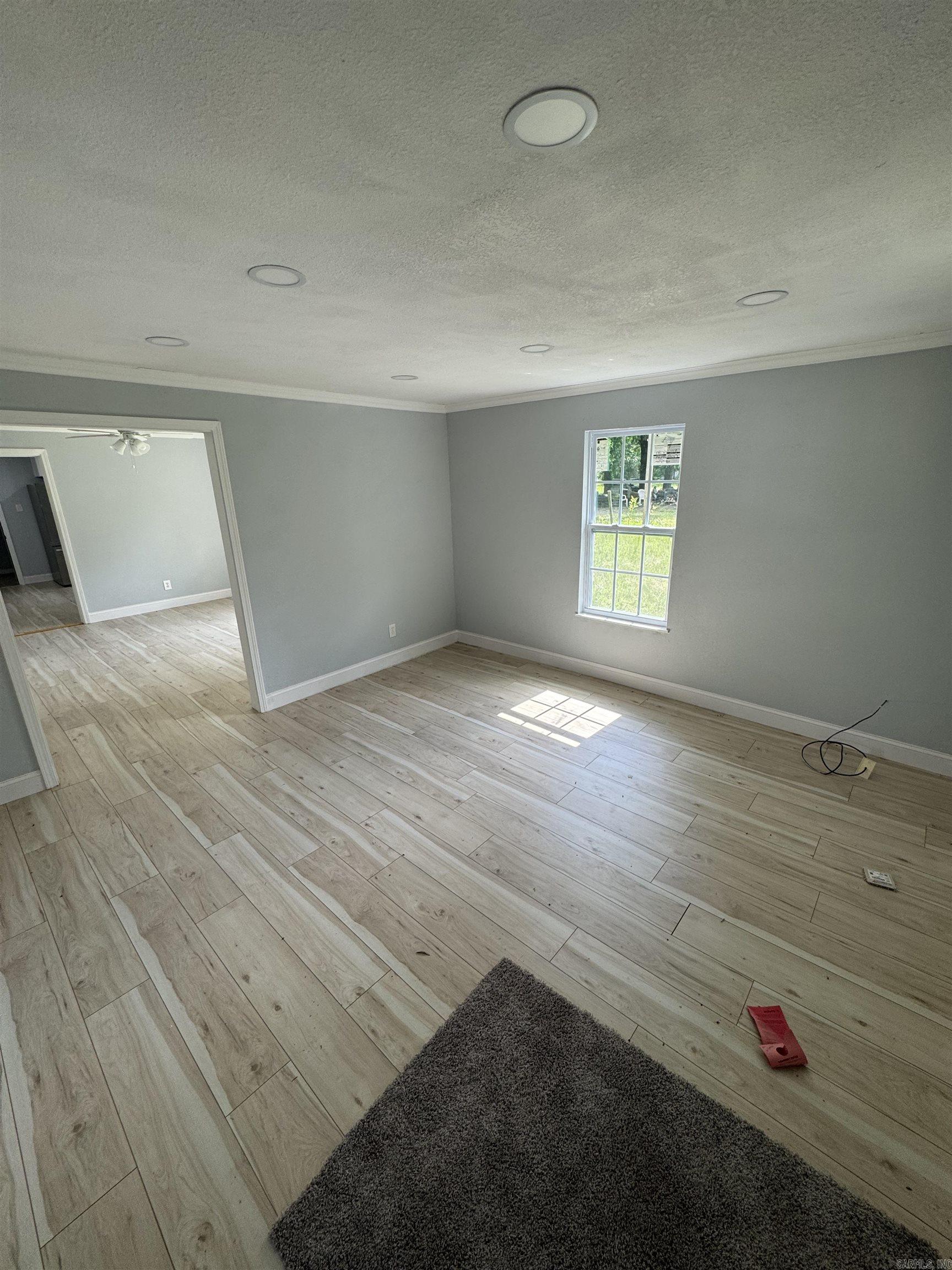 If you're looking for a fully remodeled 3 bedrooms, 1 bath home, look no further. This property has been properly updated featuring newly installed plumbing, electrical, and energy efficient windows. There is new flooring, paint, and light fixtures throughout. Let's not forget the brand-new roof. The kitchen was updated to new stainless-steel appliances, including the refrigerator and a gas stove. This is perfect for any family that loves to cook. The bedrooms are nicely sized and updated with new paint, flooring, and light fixtures. And the baths have been updated as well. Let's not forget the brand-new roof. The central heat and air run efficiently and will have a new AC condenser installed before closing. Oh, and did I mention the lot? There is plenty of room for the pets, children, and even gardening. Don't let this one get away! Don't delay! Call for your personal tour today. *More pictures to come*