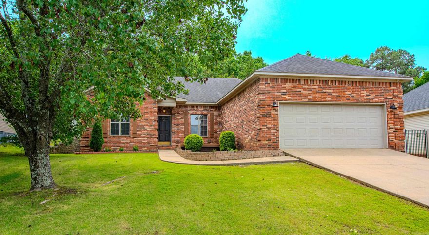 Welcome to this wonderful floor plan home with 3 bedroom, 2 bath, one level brick, with primary bedroom a part from the other 2 bedrooms.  The formal dining opens to the large living room which has gas log fireplace.  Love the little breakfast bar in the kitchen and in the hallway to the garage has a desk workstation and cabinets.  Does have a lawn sprinkler system and adt camera will stay.  The ring doesn't stay.  Spacious decking on the back of the house which also has wiring for a hot tub.   The two tvs stay with the house as well as the washer/dryer and refrigerator.  Cute, cute. Agents see agent remarks.