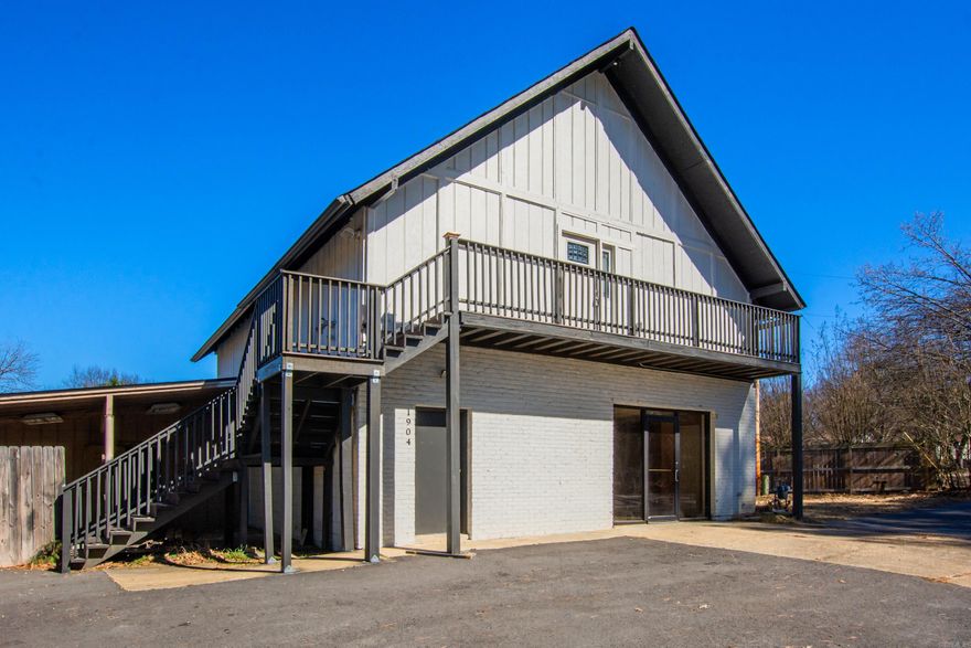 Prime opportunity in the heart of Bryant! Located just off I-30 near the Bryant exit, 1904 Evans Loop offers excellent visibility and high traffic exposure—ideal for a variety of business uses or investment potential.  This 2,400 SF property sits on a fenced .27-acre lot and provides flexibility for commercial use or income-producing residential rental. The upper level features a 2-bedroom, 1-bath apartment complete with a fully equipped kitchen, dedicated laundry room, and private balcony with exterior stair access leading to parking.  With approximately 10 parking spaces and easy access to S. Reynolds Road and I-30, this property is positioned for convenience and strong future potential. Whether you’re looking to establish your business, expand operations, or invest in rental income, this location delivers.  Schedule your showing today and explore the possibilities!