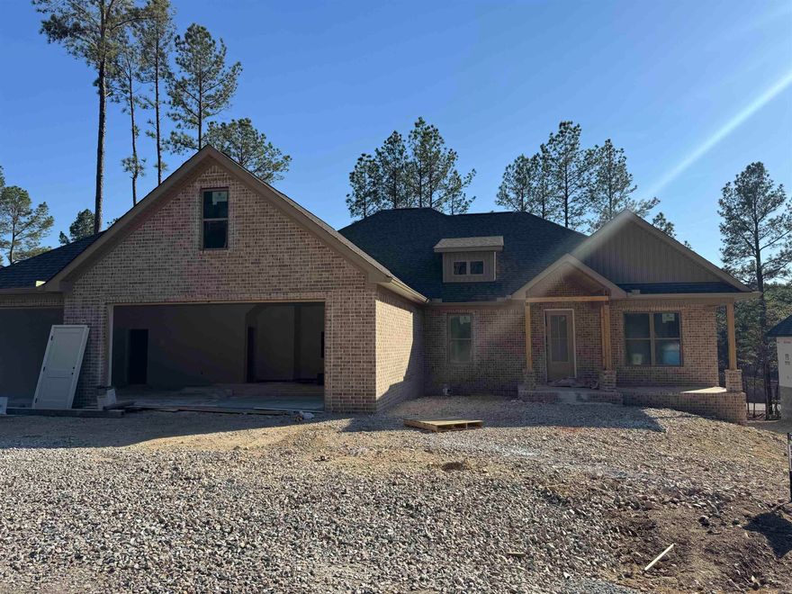 This stunning new construction home offers a welcoming modern design just one minute from the Granada Clubhouse. Thoughtfully designed with three bedrooms plus an office, 2.5 bathrooms, and a spacious dining area. This home blends luxury with low-maintenance living all wrapped up in 2,187 sq ft. The open-concept layout is enhanced by luxury LVP flooring, a functional mudroom, a gas fireplace, and sleek finishes throughout. The chef-inspired kitchen will feature quartz countertops, walk-in pantry, GE appliances and a gas cooktop, ideal for both entertaining and everyday comfort. Additional highlights include a two-car garage plus dedicated golf cart garage. Buyers who secure the home prior to completion may have the opportunity to select certain finishing touches. Estimated completion mid-April. Enjoy access to 9 golf courses, 11 lakes, and miles of trails—a lifestyle made possible by the one-time HSV buy-in fee of $2,000 for new property owners.