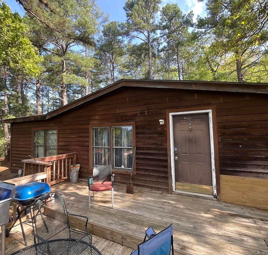 Welcome to your slice of country living! Situated on 5 acres, this 3-bedroom, 2-bath home offers endless potential for first-time buyers, investors, or those looking for their next fix-and-flip opportunity. Enjoy peaceful surroundings with plenty of space to spread out, garden, or simply relax on the large deck—perfect for entertaining or soaking in the quiet views. Conveniently located just minutes from town and the interstate, this property combines the best of rural charm with easy access to everyday amenities. With a little vision and TLC, this home could truly shine as a personal residence or income-producing property. No seller property disclosure available. Buyers to verify lot size and square footage using their own measurements.