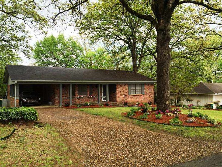 Adorable home in the Lakewood area with beautiful flowering landscaping and towering trees. This home is move in ready with fresh paint and new floors. This home has a large finished basement which has many possibilities... a game room, man cave, workout room or even a home office.  The backyard has a large deck/patio for outdoor entertaining and plenty of yard space for play.  You will love the location of this home close to shopping and entertaining but yet in a quiet quaint neighborhood.