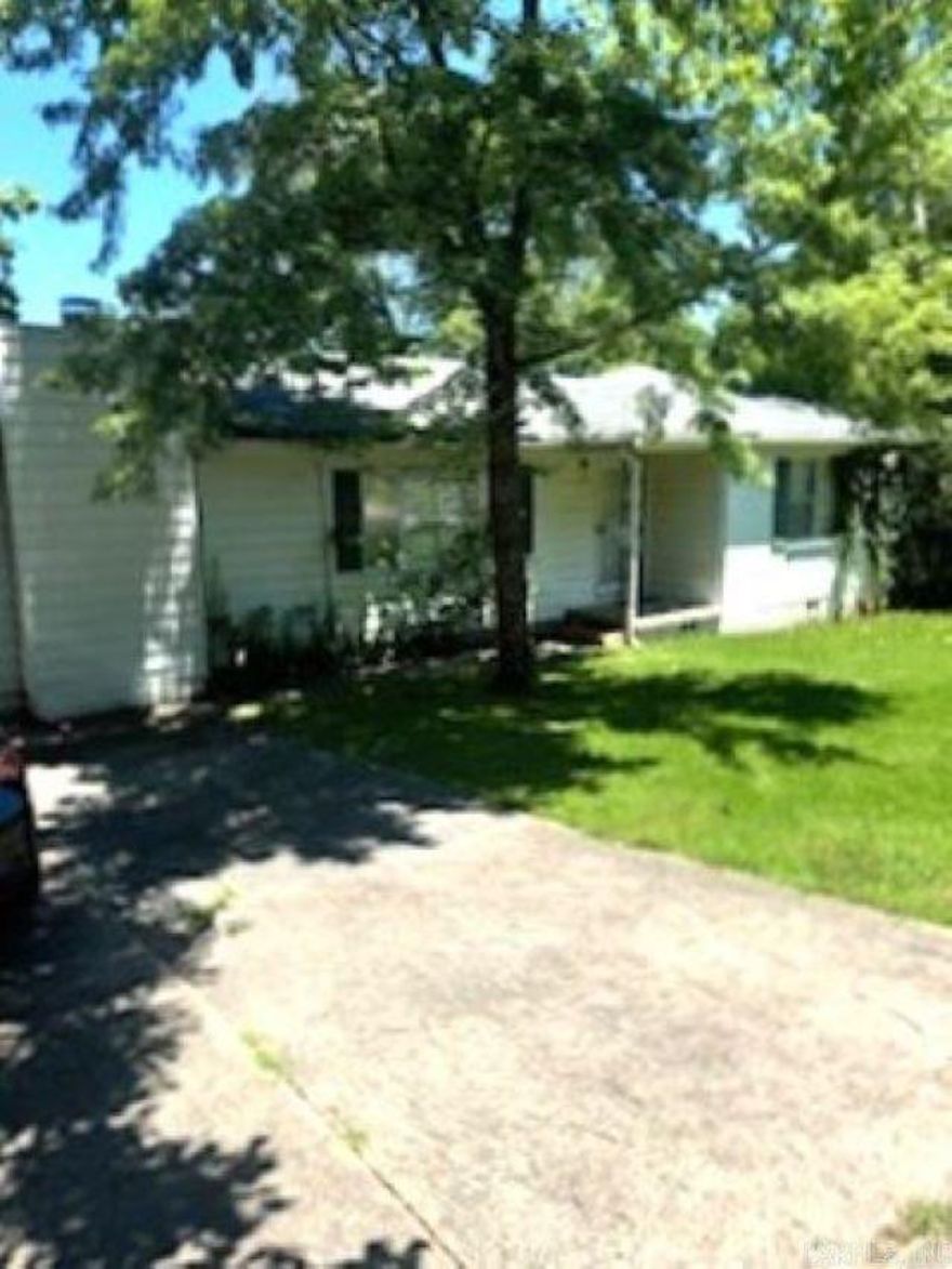 Nestled in the prime location of Mid-Town Little Rock, this charming home offers incredible proximity to the local mall, numerous eateries, and popular local spots, all within walking distance. This residence is a fantastic opportunity for visionaries ready to infuse a bit of tender loving care and personalize to their taste. Featuring hardwood floors, a spacious kitchen, and a cozy den, this property is priced attractively to sell quickly. Ideal for those looking to invest in a well-located home, it awaits your creativity and style. Act swiftly and bring all offers to secure this ideally situated home!