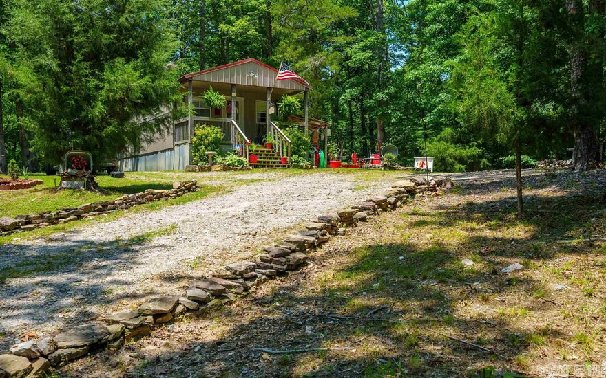 Adorable home in a country setting. This home sits on approx. 3.30 acres +/- Located close to Hot Springs, Hot Springs Village and Benton. 1 bedroom 1 bath home. Open living room and kitchen. Bath and Laundry in one room. Inside finishes are rustic with Yellow Pine walls and Tin ceilings. Great for Permanent home or AirB&B! SHOWINGS BY APPOINTMENT ONLY!