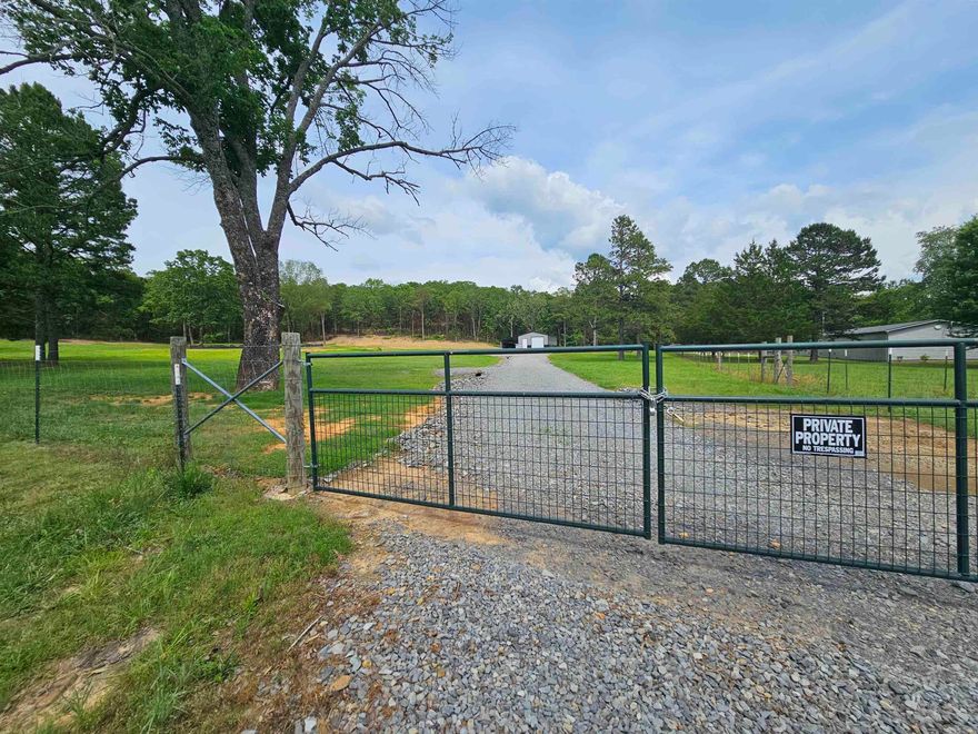YOU JUST FOUND YOUR DREAM LAND! This beautiful property has had all the work done for you! Drive through the private gate to find a custom built driveway leading up to the brand new metal shop with concrete floors and a side carport attached. A new pond has been built and is spring fed! Stock it up and enjoy it for years. A pad has also been built to start your dream home! This is the perfect land and the perfect location being on 15 minutes to Clinton and Greenbrier. Bring your floor plans and make this your homestead! For additional acreage, see the listing next door. MLS#26021355