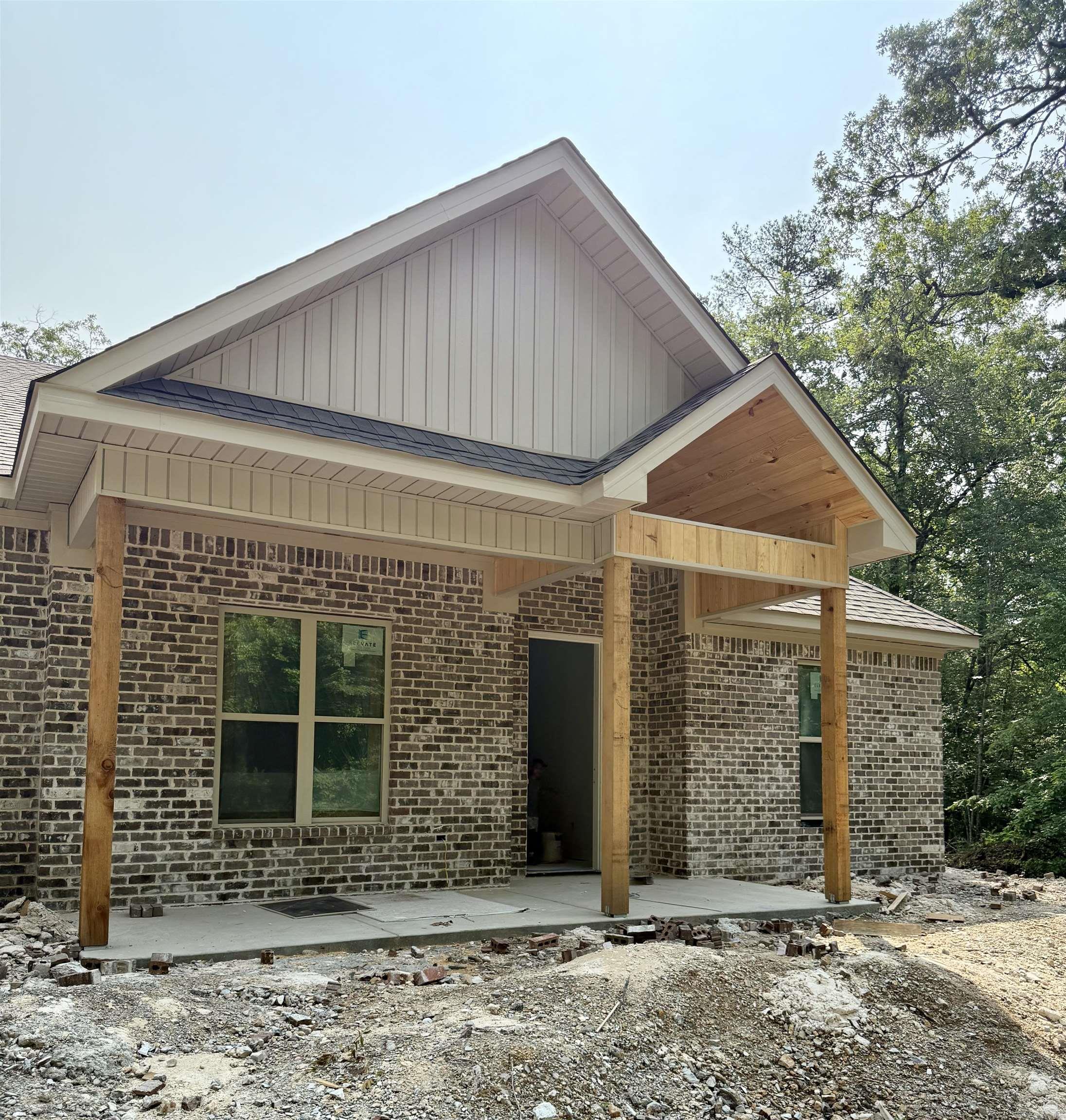 Welcome to this brand new construction home within the beautiful, gated community of Hot Springs Village! This home offers 4 spacious bedrooms, with 2 bathrooms. The exterior of the home is fully brick, and there will be a fireplace on the back porch that will make outdoor entertaining ideal. The interior boasts an open floor plan with quartz countertops, custom cabinetry throughout and a custom tile shower. This home is perfectly located being just steps away from Balboa golf course. There is still time to pick a few features if you call soon! Estimated completion is July 1, taxes is on lot only.