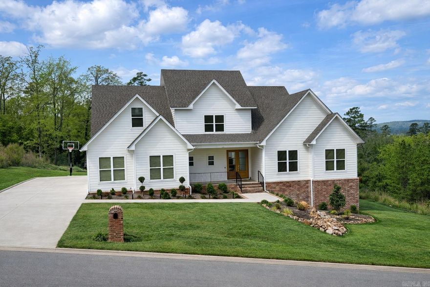 19009 Waterview Meadow Lane offers an exceptional blend of comfort, privacy, and outdoor living in a spacious, exclusive neighborhood just 10 minutes from West Little Rock, Chenal Parkway, shopping, dining, and more. Known for its large homesites and protected wooded surroundings, this community provides a peaceful, natural setting with room to breathe. Enjoy nearby neighborhood trails ideal for hiking, morning walks, or simply unwinding outdoors. The backyard is designed for both relaxation and entertaining, featuring a private swimming area and built-in outdoor BBQ, all surrounded by mature greenery and generous spacing between homes. Inside, the home is a chef’s kitchen dream with a premium Wolf cooktop, extra-wide refrigerator and freezer, and a massive walk-in pantry offering exceptional storage and organization. Comfortable, well-appointed living spaces complement the natural surroundings, creating the perfect environment for hosting, relaxing, and everyday living—if you’re searching for a private retreat where you can hike, swim, entertain, and truly unwind, this home delivers a rare combination of space, privacy, convenience, and lifestyle.