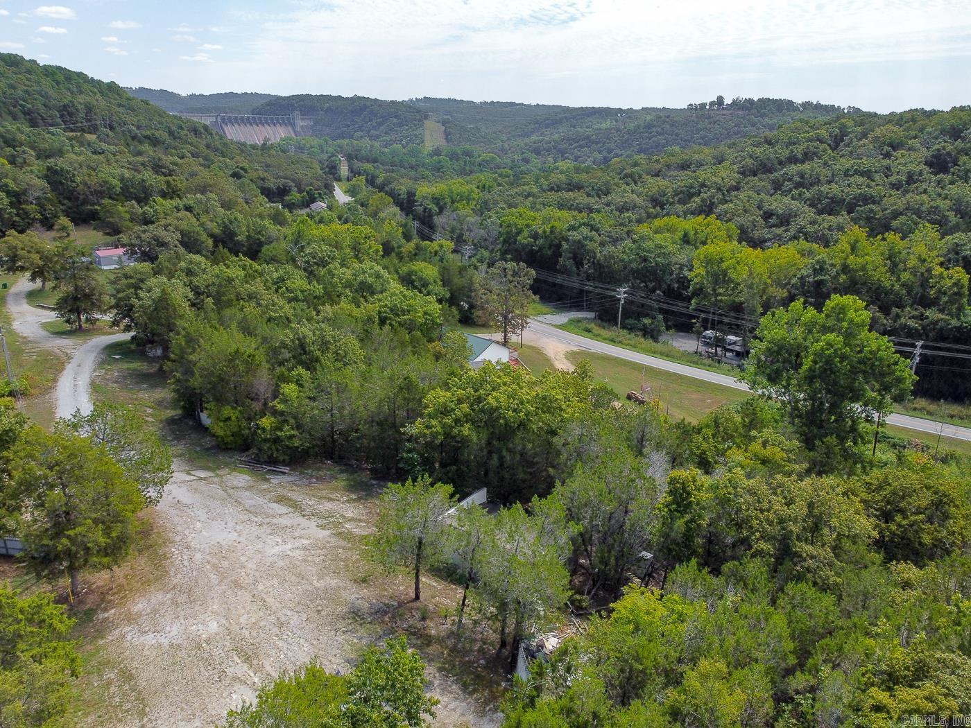 Welcome to Market 72 Piper Lane of the Spencer Addition in Salesville, Arkansas just minutes from The White & Norfork Rivers, and Norfork Lake. Opportunity knocks! This prime piece of property is ideal for outdoor enthusiasts & nature lovers with hunting & fishing nearby. Situated on 7 lots containing 1.04 +/- acres sprinkled w/ mature shade trees with electric, water, sewer, and internet available. The Sellers love the 20 x 30 metal shop for storage, rivers & lake nearby, and the opportunities for fishing, hunting, and watersports. Conveniently located near Highway 5 and favorite local amenities. Call today to make an investment in tomorrow.