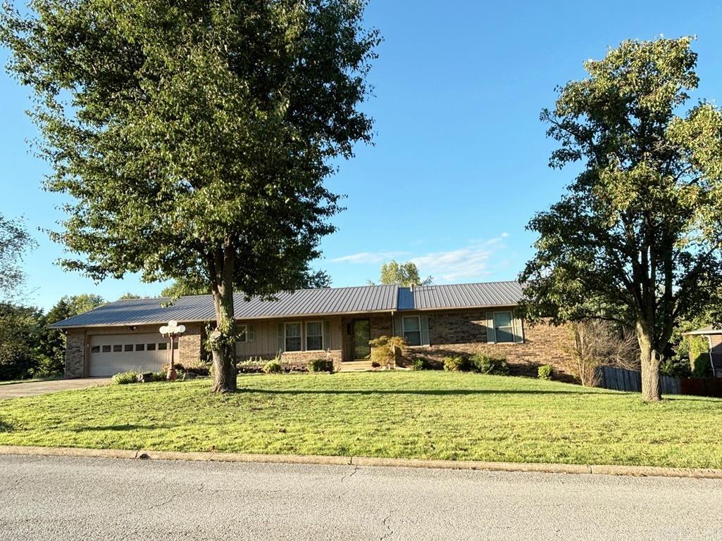 Check out this 4BR 2.5BA brick & frame ranch home in Harrison! Features include wood fireplace in large/dining area, large kitchen with lots of cabinets, spacious downstairs family room with rock hearth and wood burning stove, privacy fenced back yard and two decks, situated in convenient location in established neighborhood. Within an hour or less of Bull Shoals, Table Rock and Taneycomo Lakes, White and Buffalo Rivers, Eureka Springs and Branson MO, and numerous fishing, hunting, camping, swimming, and sight seeing venues.