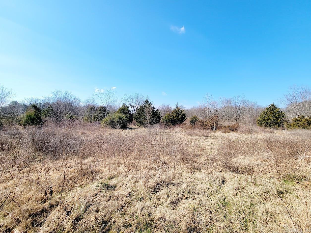 This versatile 18-acre property offers a great combination of some open pasture and woods, perfect for building a home, starting a small farm, or enjoying a variety of outdoor activities. The land is fenced, making it well-suited for livestock, horses, or agricultural use. With no restrictions, you have the freedom to use the property however you choose—whether it's for residential living, recreation, or investment purposes. The mix of wooded and open areas provides natural beauty and space to spread out. Outdoor enthusiasts will love the easy access to public hunting land and nearby fishing lakes—just a short drive away. Whether you're into deer hunting, turkey hunting, or casting a line for bass or catfish, you’ll find plenty of options close to the property. Also available for purchase is an additional 4 acres with an unfinished home, offering even more potential to expand or build.