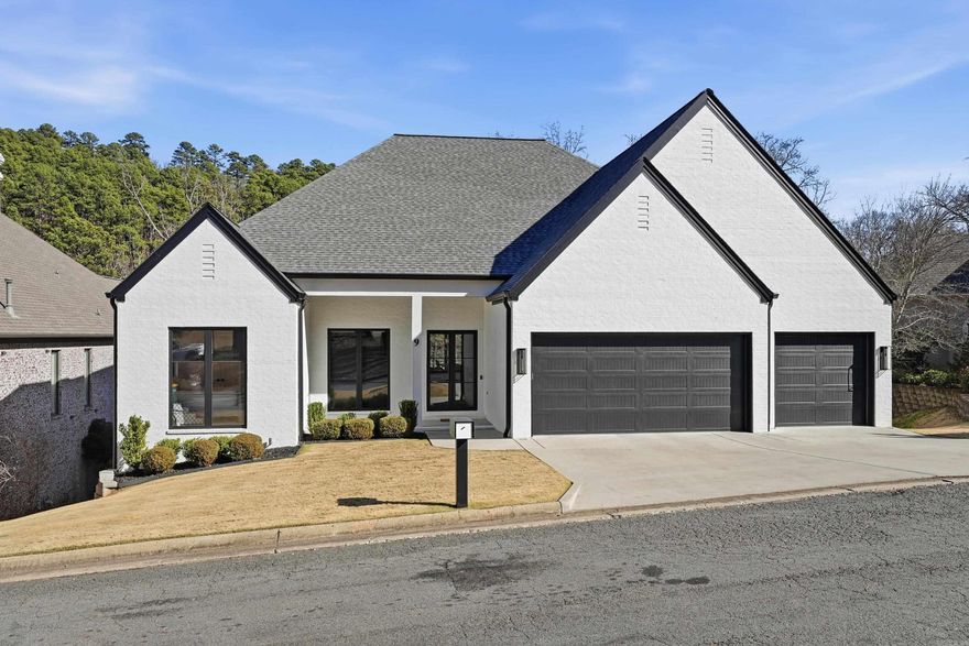 Immaculate custom built home in the gated Hickory Grove subdivision, thoughtfully designed and impeccably finished. This stunning one level residence features a spacious 3 car garage with an extra deep third bay. Built with intention, the home showcases high quality designer finishes throughout and a large open concept living/kitchen area perfect for entertaining. The chef’s kitchen opens seamlessly to an inviting entertaining bar with seating and a 129 bottle wine fridge. An office nook & a oversized pantry with antique sliding doors are conveniently located just off the kitchen. The primary suite offers generous space and comfort, featuring a spa inspired bath with a Kohler Veil freestanding soaking tub, a walk-in shower with a digital shower valve, and a spacious walk-in closet connected to the laundry room. On the opposite side of the home, you’ll find 2 additional bedrooms, full bath, & a flex space ideal for a office, media room, workout area, etc. Additional premium features include a mini-split system in the garage, Andersen windows and doors, motorized shades, Kichler exterior lighting, an encapsulated crawlspace, and more. Lawn maintenance included. **Agents see Remarks*