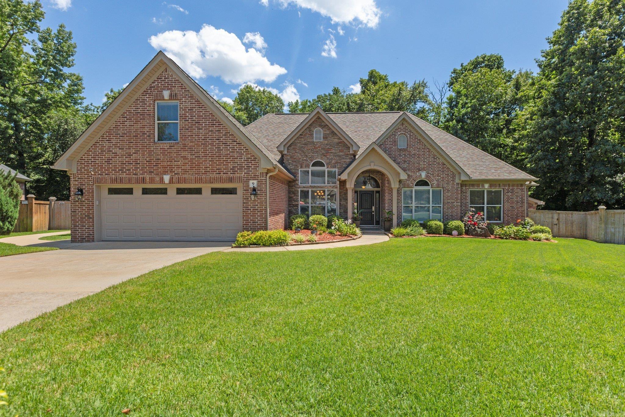 Buyer financing fell through! Their loss is your gain! No fault of seller or home. 9 Foxfield Cove, where luxury & functionality converge in the coveted Woodlands Edge community of West Little Rock. This custom-built residence boasts a spacious, flat lot backing onto protected green space, offering abundant natural light & a striking grand entry that welcomes guests into an open concept design. The heart of the home is a chef's kitchen, overlooking a living area adorned with a stacked stone fireplace adjacent to a delightful breakfast nook. For more formal gatherings, a dining area w/ expansive ceilings awaits. Enjoy an exceptional secondary indoor/outdoor living space, featuring a cozy fireplace, a convenient half bath, & an indoor grilling station complete w/ beverage fridge, sink, & industrial vent hood. Enjoy breathtaking views of the resort-style pool & meticulously landscaped grounds from this remarkable space. Step outside to your own private oasis where relaxation meets luxury. Lounge by the heated saltwater pool, float your cares away, or unwind in the perfectly positioned hot tub beneath a custom-built pavilion with yet another fireplace. Too many extras to list!