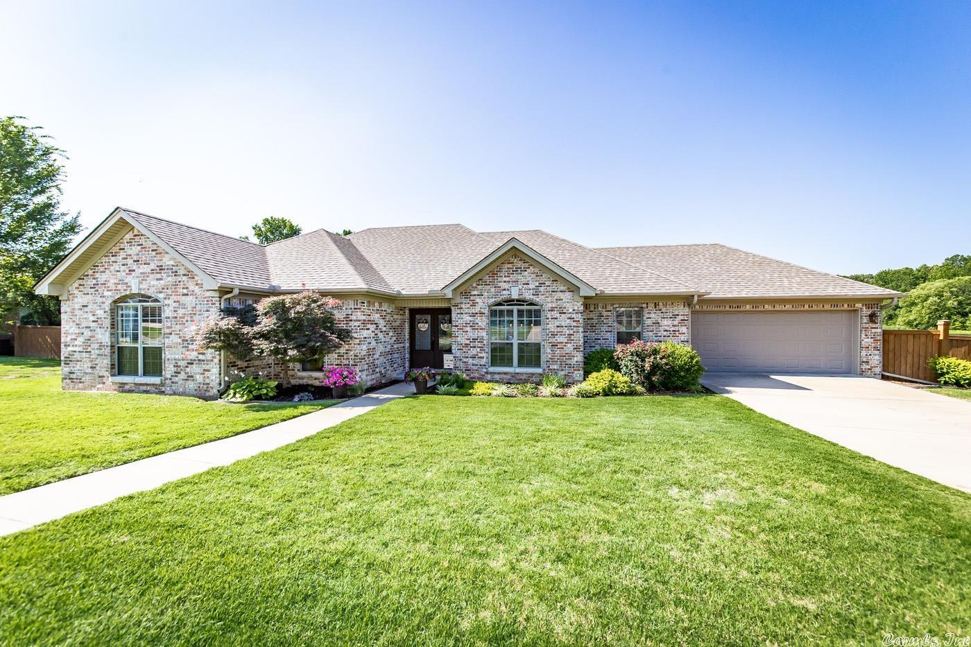 This home is a show-stopper!! Beautiful updates in the kitchen and bathrooms! From quartz countertops to marble backsplash, you will have all the YES's here! You will appreciate the brand new carpet and gorgeous hardwood floors along with the fun tile in the laundry room! This open concept gives just the right amount of privacy so you're not all in the same room at the same time but close enough for entertaining! The architectural roof was put on in 2022! The owners have maintained this property like pros! It sits on almost 1/2 an acre and backs up to the spillway feeding Indian Head lake. You can fish from your own backyard! It is so peaceful and serene just hanging out on the new back deck area. There is no flood insurance required. See attached documents for property disclosure and appraiser measurements. SEE AGENT REMARKS!