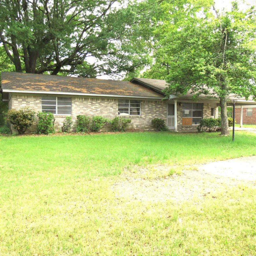 Brick home located at dead street. this home has 2 living areas, 3 bedrooms, 2 baths, laundry room and office with exterior door.  Small storage building in backyard.  Taxes are before Homestead Credit. **Agents See Remarks**