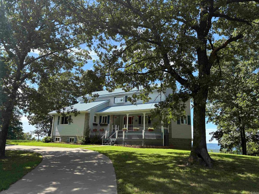 Gorgeous Lake View from every room and multiple decks! 2 Story plus walkout basement apartment with own exterior access. Elevator lift to top floor master... and best view in the home! Large detached garage/carport/shop/storage plus Exercise POOL room! Amazing AirBnB opportunity.