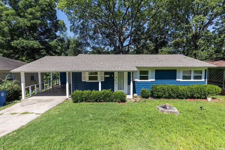 Welcome to this delightful 2-bedroom, 1-bath home located in the sought-after Hillside neighborhood of North Little Rock. This charming residence features beautiful hardwood floors throughout, adding warmth and character to the living spaces.  The inviting living room boasts a large picture window that offers a scenic view of the backyard and seamlessly connects to the dining area, perfect for entertaining. The galley-style kitchen provides ample cabinet and counter space.  Each of the three bedrooms is generously sized, ensuring comfort for everyone in the household. Additional amenities include a convenient laundry area and extra storage space.  Step outside to the back deck, where you can relax and enjoy the peaceful, spacious backyard—an ideal spot for outdoor activities and play. The property also includes a carport and plenty of off-street parking for your convenience.  Don't miss out on the opportunity to make this charming Hillside home your own!