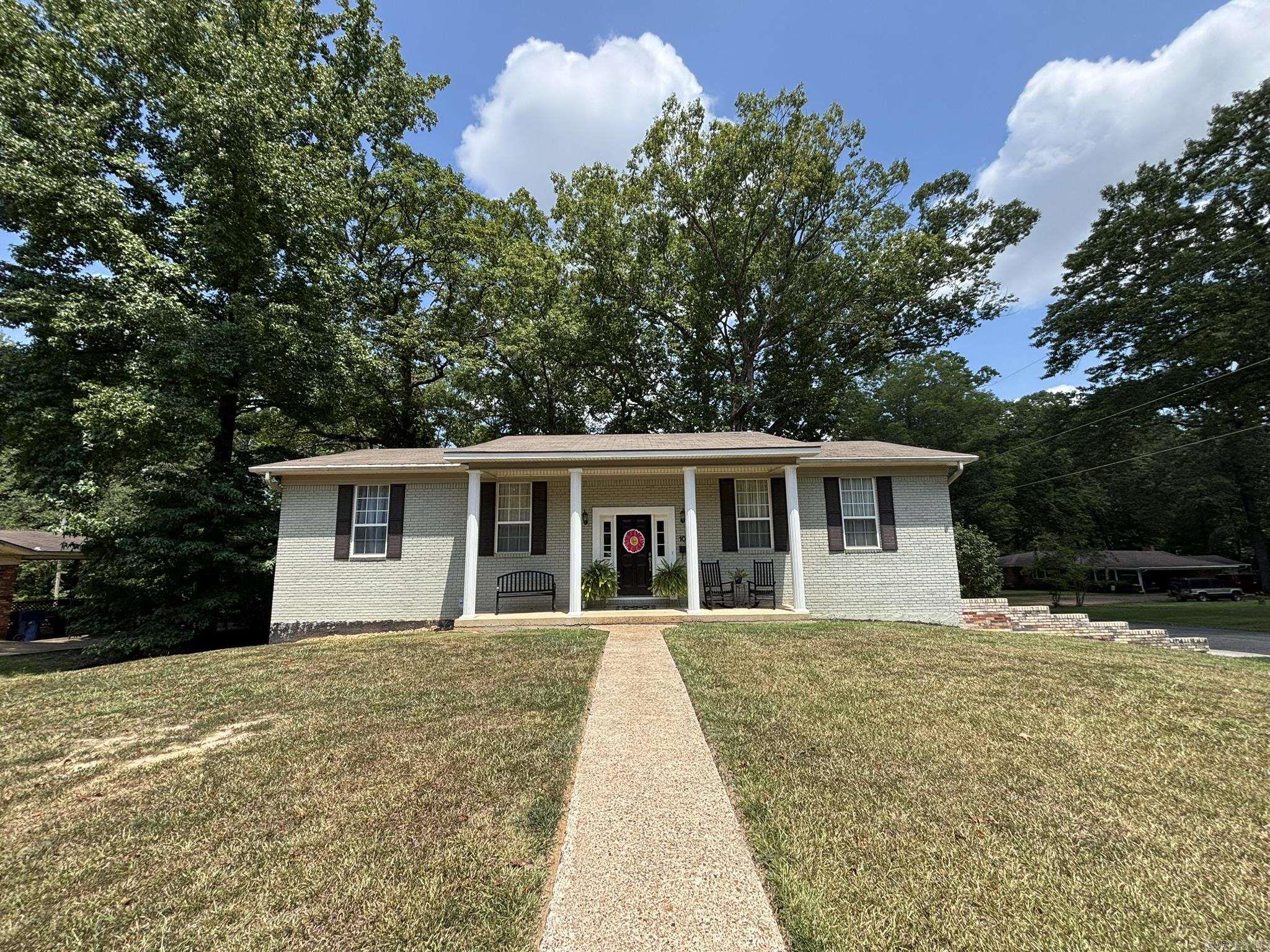 This well-maintained brick home offers an open floor plan with light, neutral colors & plenty of natural light. The kitchen is well-equipped w/ a breakfast bar & flows easily into the spacious LR/DR combo. The primary suite features double closets & a marble walk-in shower, while the hall bath boasts a marble tub/shower combo. Enjoy two living areasāone with built-in bookcases, cabinets, & access to the rear patio. The oversized laundry/craft room provides space for hobbies, ironing, & storage, w/ washer & dryer included. A convenient ½ bath & 4th BR/guest room adjoin the den, perfect for guests or family. The oversized double garage with openers has room for sports gear & holiday dĆ©cor, while the 20x22 exterior shop/storage building makes a great he-shed/she-shed. A whole-house generator adds peace of mind during outages. This home has space, function, & extras youāll loveādonāt miss it!