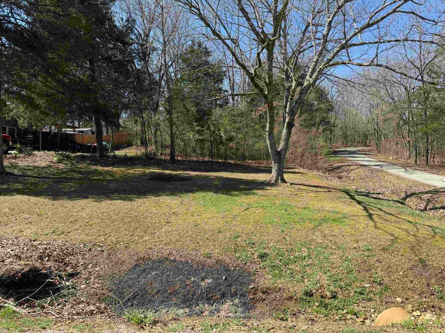 Nice lot partial grass partial wooded, near south fork river and North golf course. Ready for a new owner