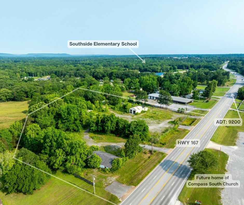 This commercial property in Southside, Arkansas, offers a rare and valuable opportunity in one of Independence County’s fastest-growing areas. With 500± feet of direct highway frontage on a highly traveled road averaging 9,200 vehicles per day, this site provides incredible visibility and access for virtually any commercial development. All utilities are on the property, including city sewer. Located just minutes from the local school, this property is perfectly positioned for a wide range of business opportunities. With this much land, highway frontage, and multiple entrances- the possibilities are endless, including: Restaurant: Plenty of space for restaurant or fast-food chain. Retail Strip Center: Build a shopping plaza or convenience center. Medical or Office Complex: Great for clinics, dentists, or professional services. Fuel Station/Travel Center: Capitalize on traffic flow for a convenience store or truck stop. Multi-Use Development: Combine retail, office, and service businesses. Franchise Opportunities: Bring national brands to a community that’s ready to support them. Opportunities like this don’t come around often—secure your place in Southside's future.