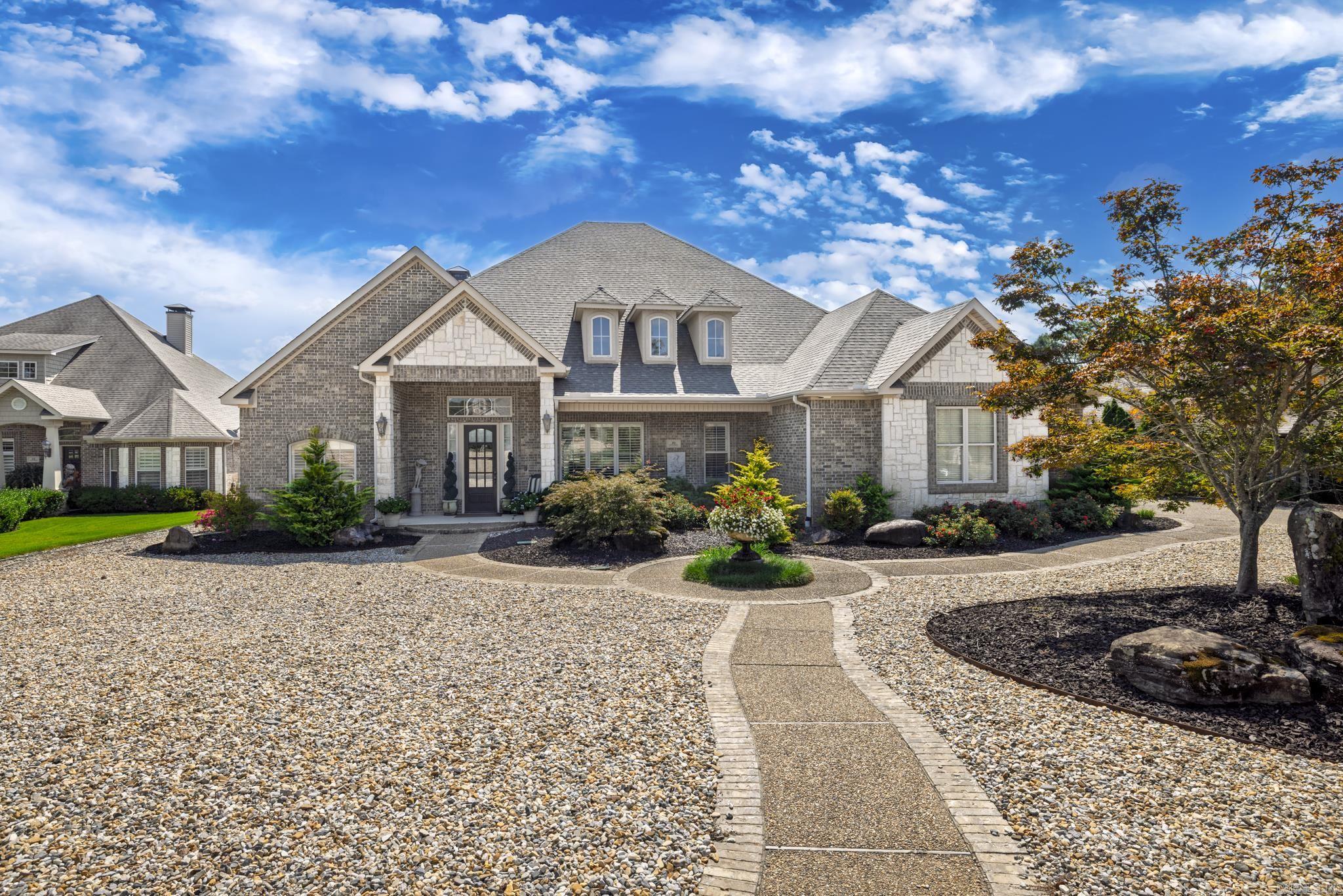Beautiful one-story Lake Maria home built by Carriage Custom Homes with all the upgrades & special features of their homes—volume ceilings, open concept, divided bedrooms, hardwood floors, all brick, covered patio with BIG lake view, and a 3-car garage. Sitting on a ½ acre lot, the sellers have also made a great addition to their professionally landscaped yard—an inground, heated, saltwater pool surrounded by a wrought iron fence! From the stunning curb appeal to the boat dock on the lake, buyers will feel they’re on vacation all year long! SEE AGENT REMARKS
