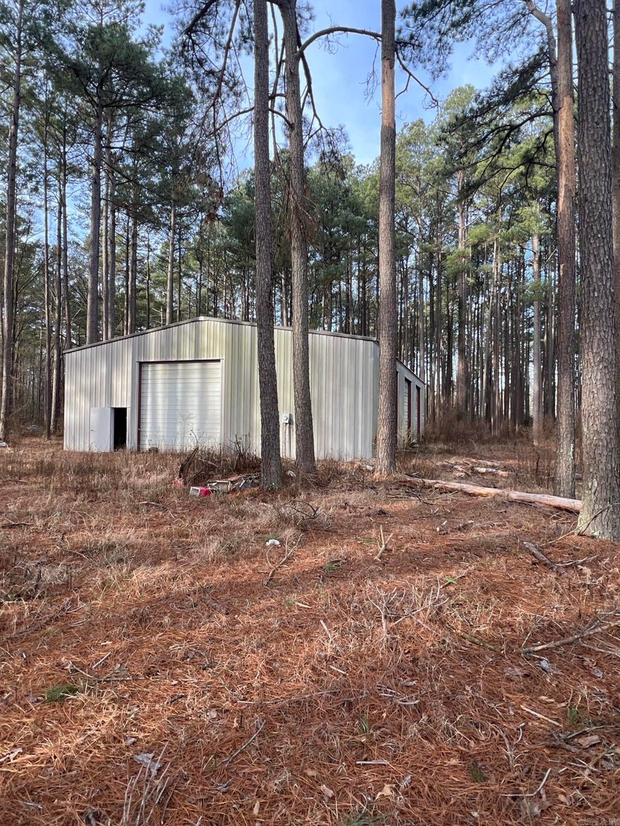 15+/- Acres with LARGE SHOP! Harvestable Timber! Great for mini farm, homestead or business and home.