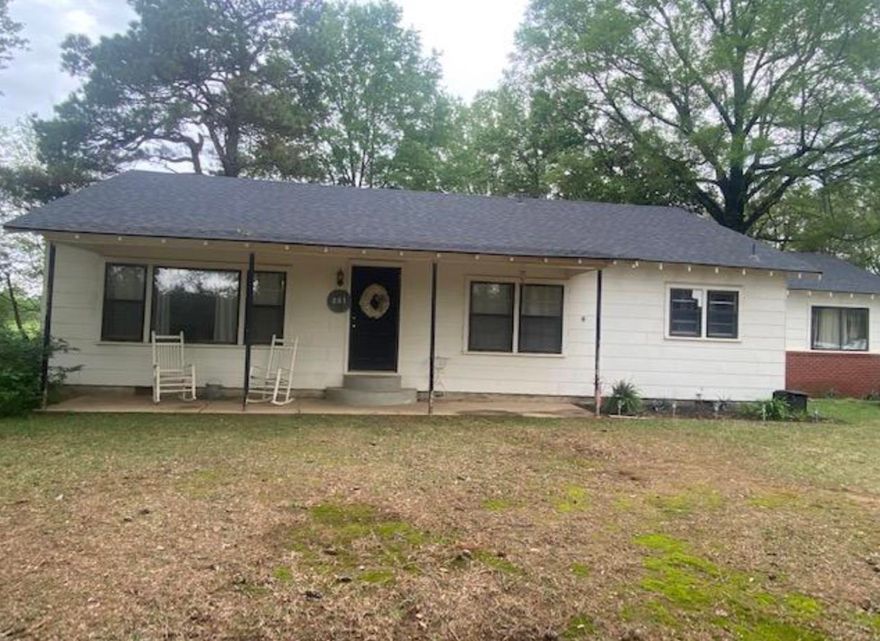 Open dining/living room, attic fan, fresh exterior paint, masonite siding, septic tank, prescott Rural water, new roof in 2022, New HVAC in 2018, original hardwood floors