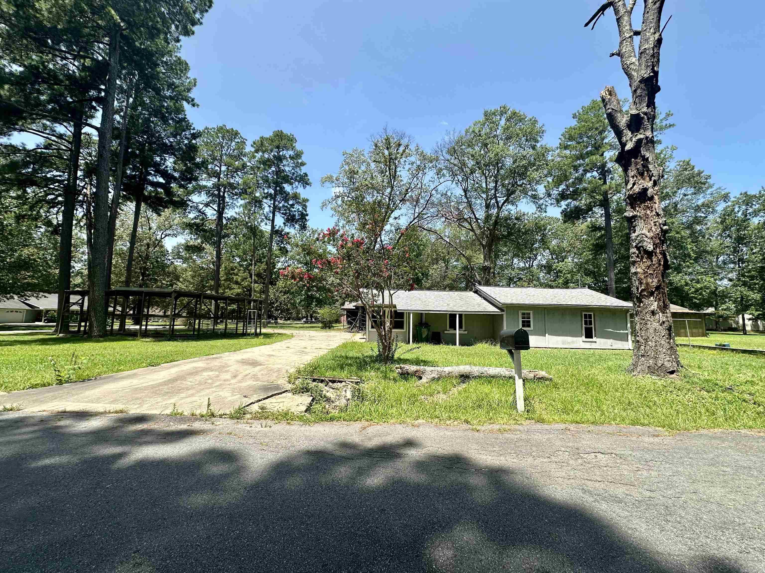 Great Investment Opportunity!! Previously a 3-bedroom, 1-bathroom home on a 0.55-acre corner lot. Home will need to be rebuilt or restored to its original condition. Property features a concrete Koi pond and 2 outdoor storage buildings. One of the storage buildings has electricity and water ready for all your outdoor needs. Agents, please see remarks!